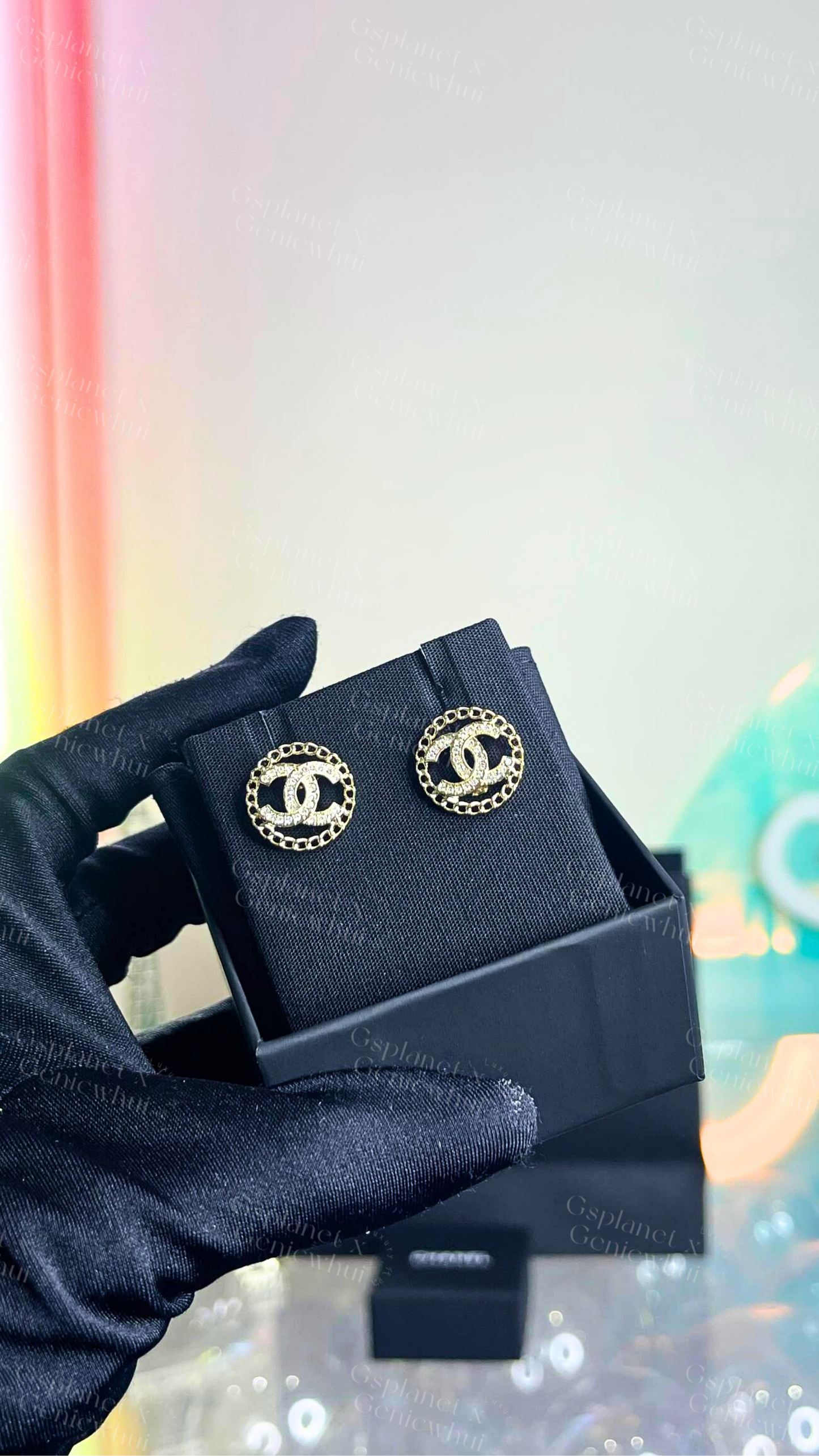 CHANEL Hollow Crystal Stud Earrings