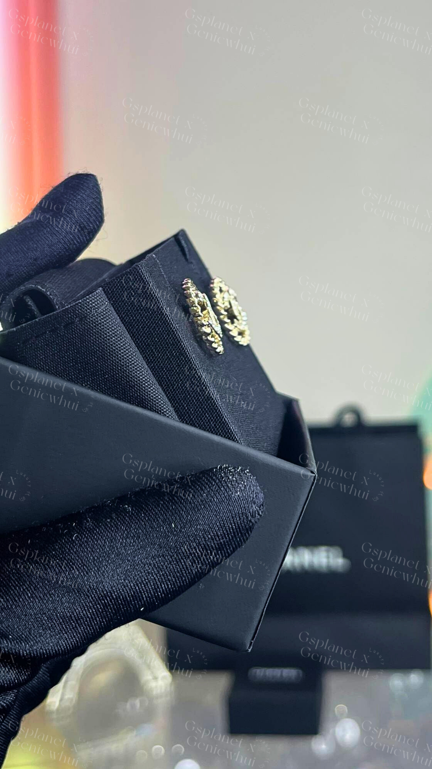 CHANEL Hollow Crystal Stud Earrings