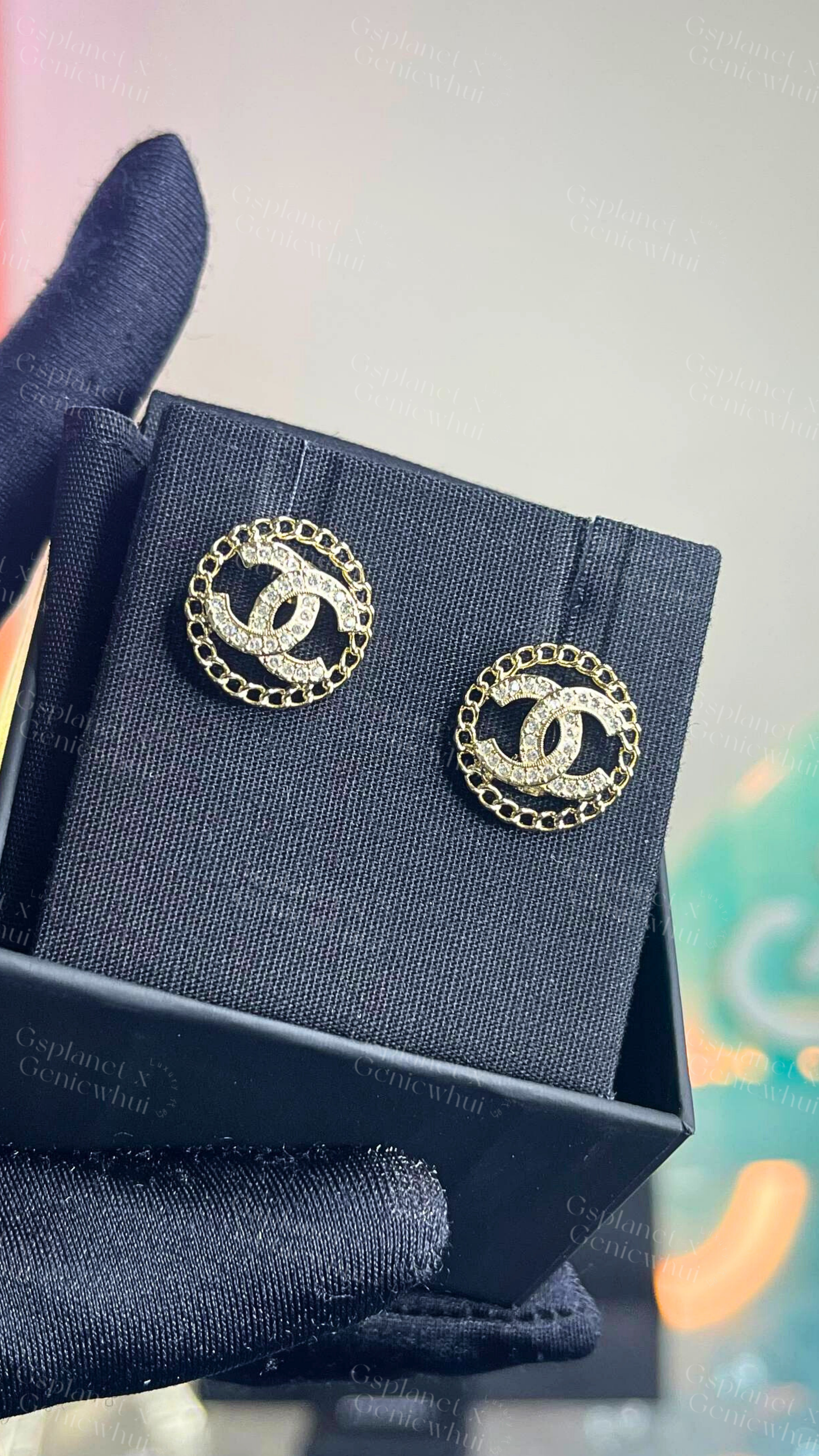 CHANEL Hollow Crystal Stud Earrings