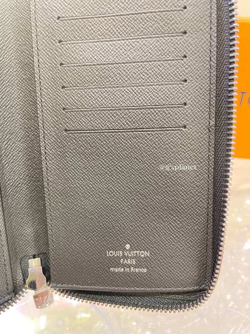 LV Zippy Wallet Vertical