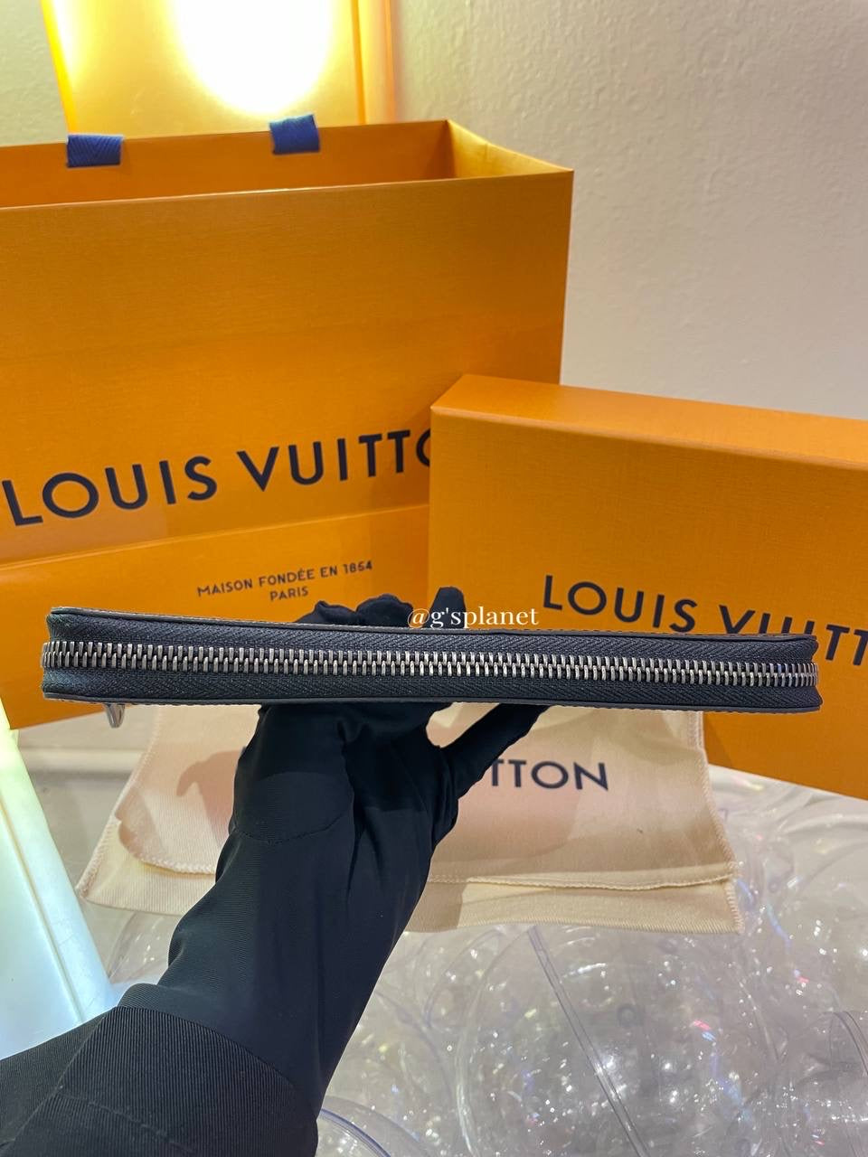 LV Zippy Wallet Vertical