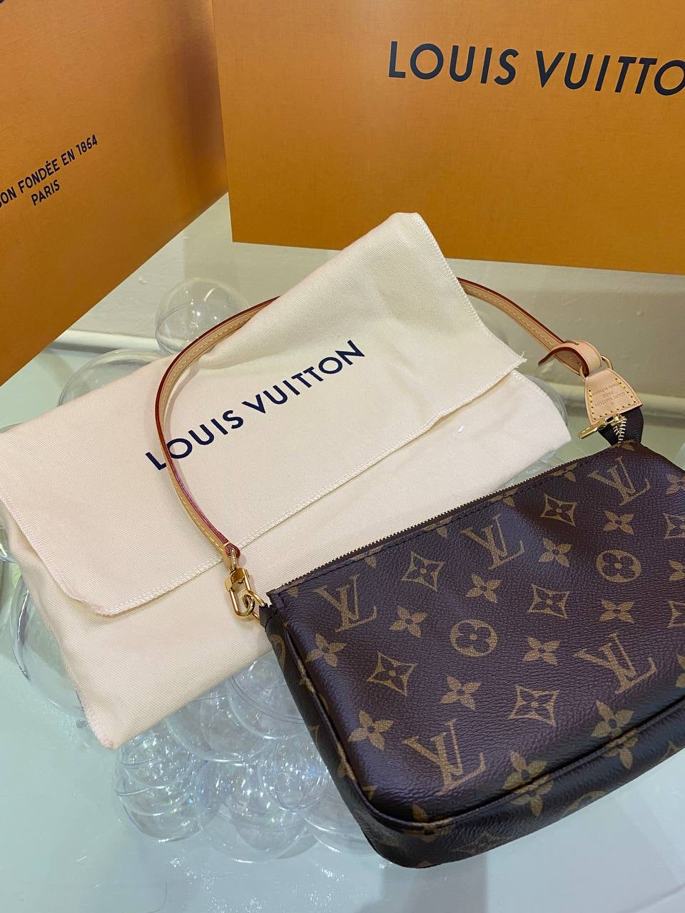 LV Pochette Accessoires