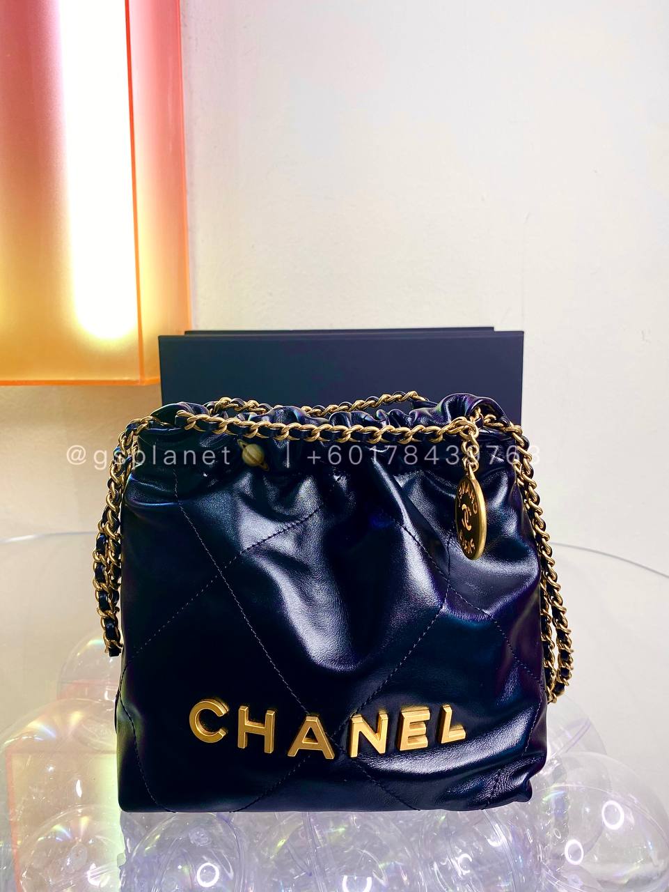 CHANEL 22 MINI HANDBAG