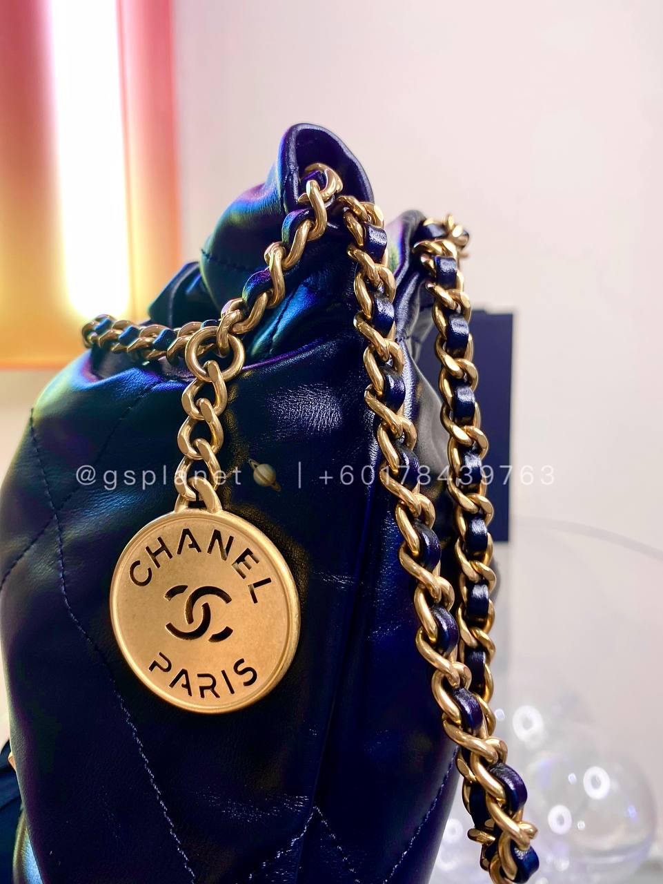 CHANEL 22 MINI HANDBAG