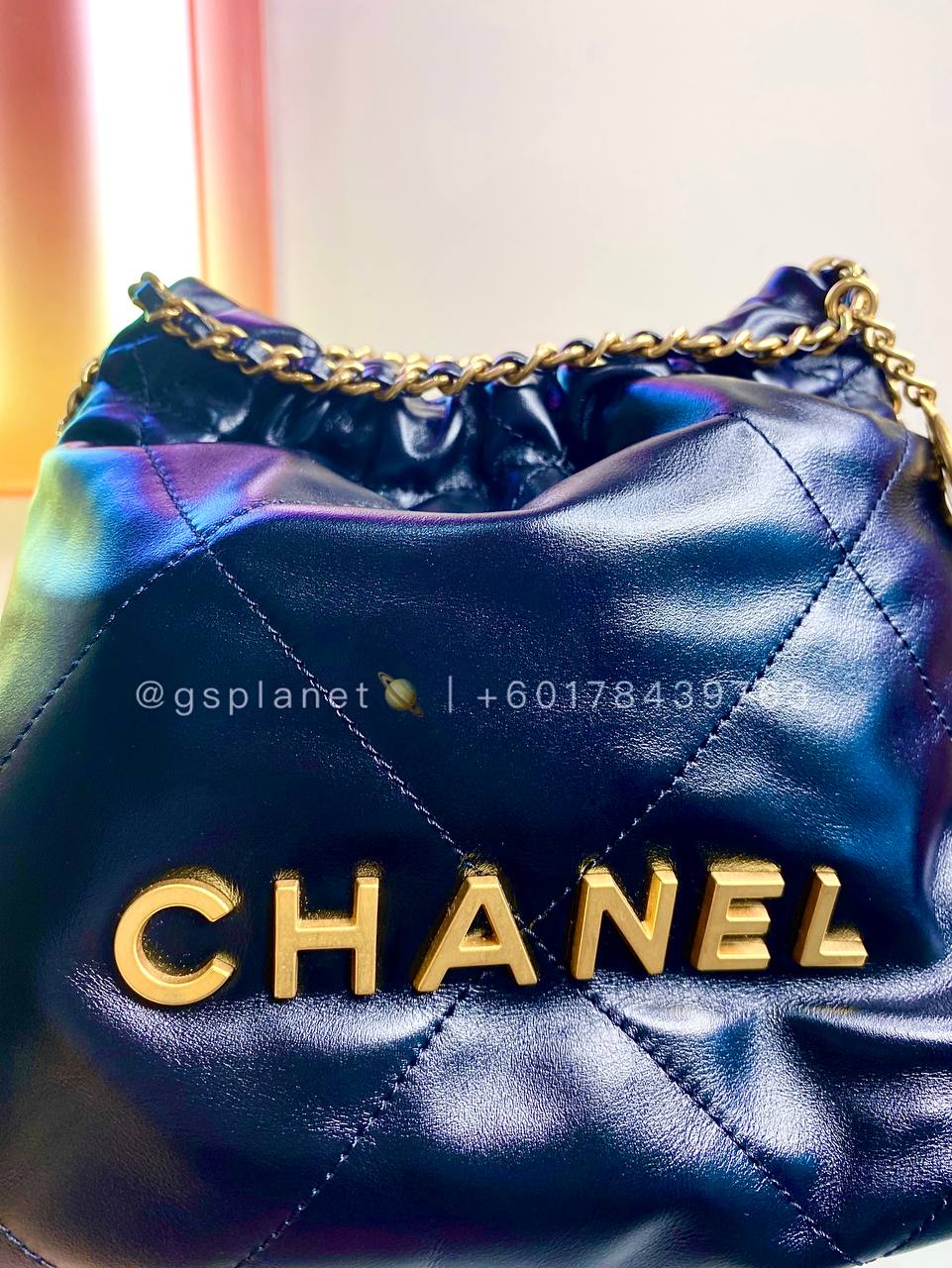 CHANEL 22 MINI HANDBAG