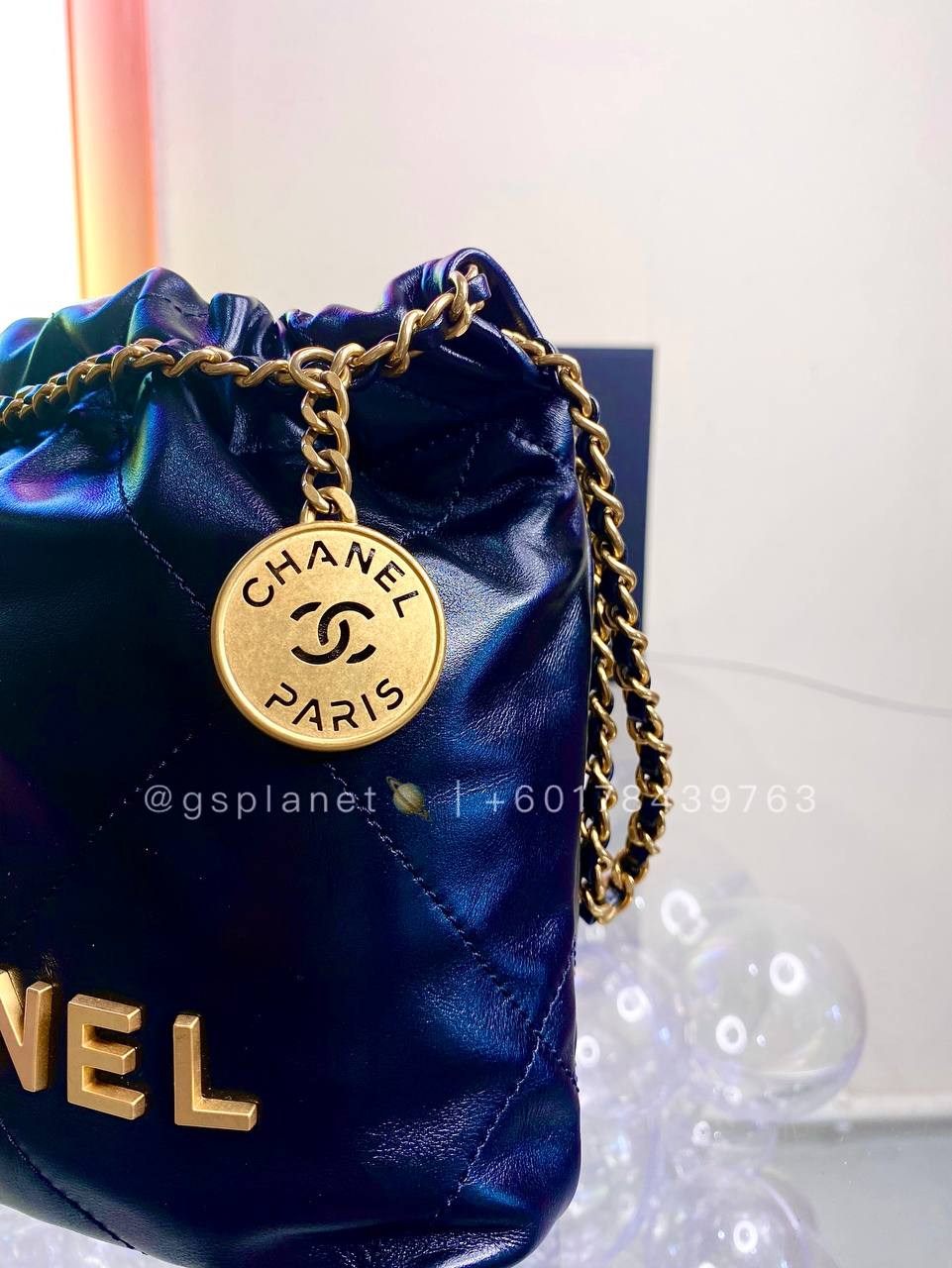 CHANEL 22 MINI HANDBAG